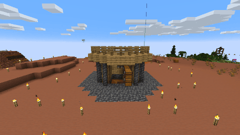 Noelle's hut. Cobblestone walls with an oak plank roof in the middle of a mesa.